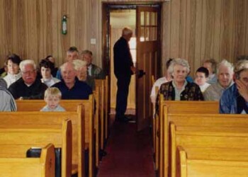 Group sitting at back of church
