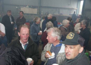 Feeding time and shelter out of the rain in Murdo's shed People eating and drinking tea in a slightly smokey shet
