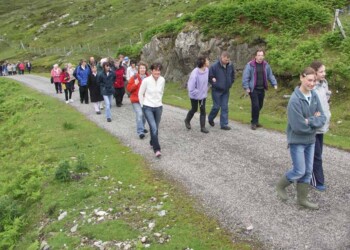 Group walking up a hill