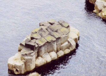 Close-up of the unusual formation rising out of the sea at the Shiants Small island with unusual rock formation