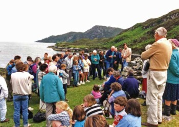 Murdo reading a bible verse to the group. Murdo reading a bible verse to the group.
