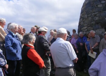 A talk in front of the monument
