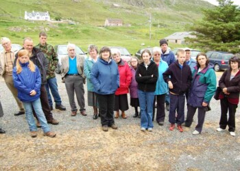 Group of people standing in car park