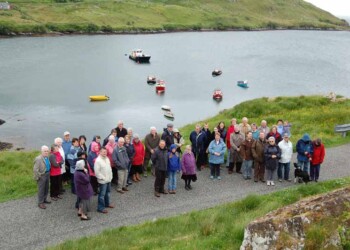 Group photo with Lemreway harbour in background