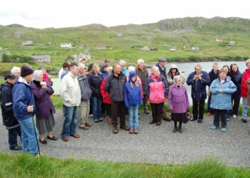Group watching someone who is out of shot