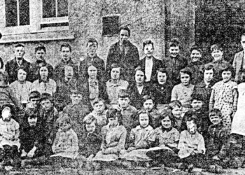 Cromore School 1932: Back Row l-r: Mary Mackenzie, Crossbost, Teacher; Donald J Macleod, 26 Cromore; Roddy J Mackinnon, Torostay; Alex M and Alex J Smith, Caros, Cromore; George Macarthur, 24 Cromore; Angus Macleod, 14 Cromore; William Mackinnon, 7 Cromore; Murdo Smith, 15 Cromore; Angus Macleod, 11 Cromore; Mr Maclennan, Headmaster Second Row l-r: Margaret Smith, Caros; Mary Macleod, 28 Cromore; Catherine Macdonald, Torostay; Rhoda Macaulay, 1 Cromore; Joan Mackinnon, Caros; Christine Mackinnon, Torostay; Peggy A Macarthur, 10 Cromore; Mina and Margaret Macleod, 21 Cromore; Marion Mackinnon, Torostay; Mary Bell Smith, 15 Cromore; Bella Macleod, 11 Cromore Third Row l-r: Angusina Macleod, 11 Cromore; Roddy A Macleod, 28 Cromore; Angus Smith, Caros; Donald Kennedy, 1 Cromore; Murdo Macdonald, 23 Cromore; Kenneth Mackinnon, Torostay; John A Macleod, 14 Cromore; Kenny J Macleod, Cliff Cottage, Cromore; Alex D Smith, 15 Cromore Front Row l-r: Betty Smith, Caros; Peggy Macdonald, Torostay; Mary Macarthur, 20 Cromore; Katie B Nicolson, 7 Cromore; Rhoda Morrison, 25 Cromore; Bella M Macleod, 14 Cromore; Kate Macarthur, 10 Cromore; Marion Smith, 10 Cromore; John Macleod, 11 Cromore Class photo Cromore School 1932