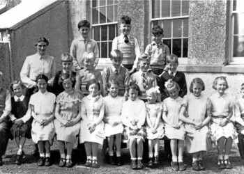 Kershader School 1957: BACK ROW Freddie Mackinnon, 11A Habost; Donnie Macdonald, 7 Kershader; Donald M Morrison, 8 Garyvard. SECOND ROW Mrs. Macrae Teacher; Iain N MacLeod, 10 Kershader; Roddy A Mackinnon, 2 Garyvard; Donald J MacLeod, 5 Garyvard; Murdo I MacLeod, 4 Garyvard; Iain D MacLeod, 5 Kershader; FRONT ROW Donald A MacLeod, 5 Garyvard; Ishbel MacDonald, 9 Habost; Chrissie Mackinnon, 11A Habost; Mary Macrae, 5 Habost; Nora MacLeod, 9 Garyvard; Annie F Montgomery, 11 Garyvard; Cathie A MacLeod, 12 Kershader; Mary Montgomery, 11 Garyvard; Margaret MacLeod, 5 Garyvard; Chrissie A Montgomery 11 Garyvard; Mary A Mackinnon 2 Garyvard; Finlay MacDonald, 7 Kershader. Class photo Kershader School 1957